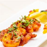 Shrimp Balchao · Spicy. Fiery pan-fried shrimp, onion-chilli.