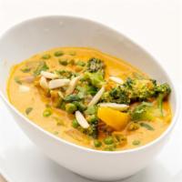 Navratna Korma · Nuts. Assortment of freshly cut vegetables and cheese, creamy nut sauce.
