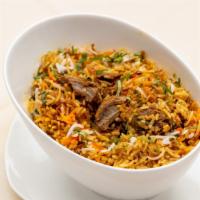 Goat Biryani · Baby goat meat, basmati rice cooked in a sealed pot with aromatic spices.