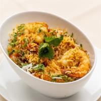 Shrimp Biryani · Basmati rice, aromatic spices.