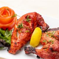 Tandoori Chicken · Half chicken, yogurt marinade, fresh ground spices.