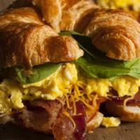 Croissant, Egg & Cheese Breakfast Sandwich · Fluffy scrambled eggs and melty cheese on a flaky, buttery croissant.
