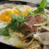 Sizzling Beef W. Egg · Bò Né ( Sizzling beef steak and sunny side up eggs with bread.)