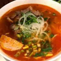 Bún Bò Huế · Spicy beef noodle soup.