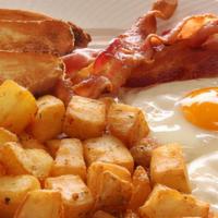 Classic Breakfast · Two eggs your way, choice of meat, home fries or grits and toast