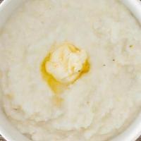 Good Ol' Grits · YB's famous, creamy grits topped with butter. Try a sample, you will be happy you did!