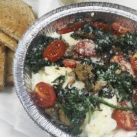 The Sundance · Grits or home fries topped with egg whites, grilled mushrooms, grape tomatoes, baby spinach ...