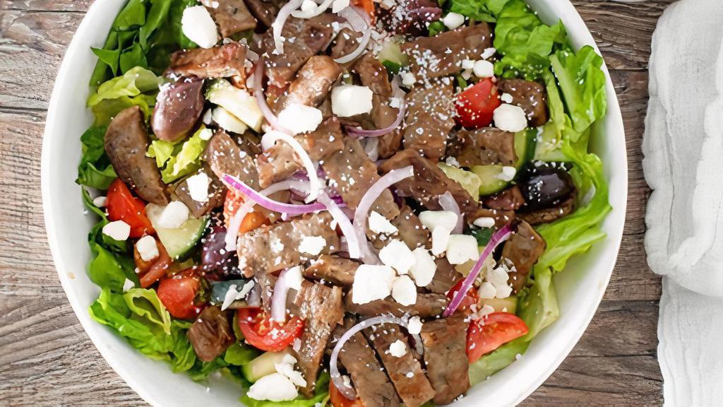 Mediterranean Salad · Romaine, kalamata olives, cucumbers, tomatoes, red onions and feta served with our Zesty dressing / Add gyro meat or grilled chicken