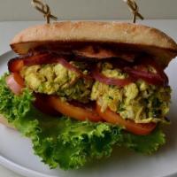 Yellow Curry Chicken Club Sandwich · Chicken salad, lettuce, bacon, golden raisins, pickled onions
