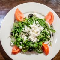 Arugula & Goat Cheese Salad · Arugula, sliced tomatoes, onions, black olives, goat cheese & balsamic vinaigrette