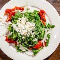 Roasted Peppers & Goat Cheese Salad  · Homemade roasted red and yellow peppers, arugula, red onions and goat cheese in a sweet bals...