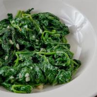Spinach · Fresh Spinach boiled and them sautéed with Garlic and Oil