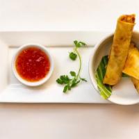 Spring Rolls  · Crispy, filled with  chicken served with a sweet & sour dip.