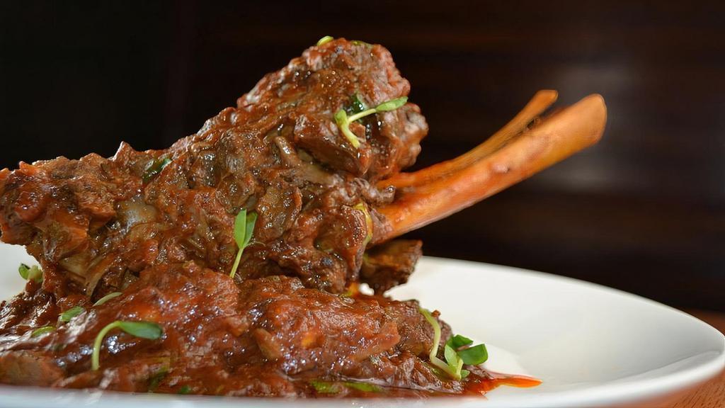 Lamb Rogan Josh · Succulent cubes of lamb cooked with yogurt, onion and kashmiri spices.