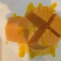 Mango Kulfi · Traditional Indian ice cream flavored with green cardamom and rose water or mango.
