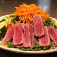 Seared Ahi Tuna Salad · Black pepper pan-seared rare tuna, organic greens, cucumber, sweet red pepper, carrot, snap ...