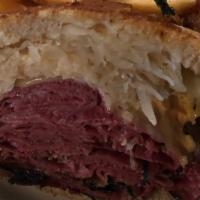 Rueben Sandwich · Corned beef, pastrami, or combo. French fries.
