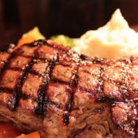 New York Strip · Fourteen ounces cut. Char-broiled. Choice of baked potato or french fries. Seasonal vegetabl...
