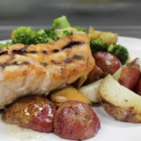 Grilled Salmon · Char-broiled. Roasted red potatoes, seasonal vegetable medley, lemon vinaigrette.