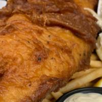 Fish & Chips · Beer battered cod fried crispy. House made coleslaw, french fries, tartar sauce on the side.