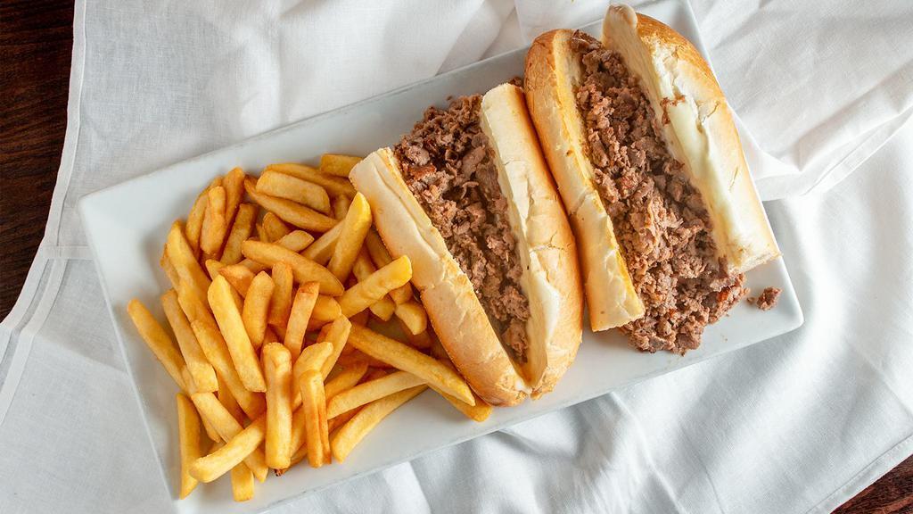 Philly Cheesesteak · served with steak fries.