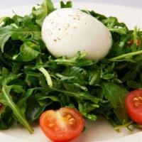 Burrata · Served with arugula, cherry tomatoes and truffle oil.