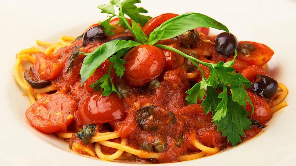 Spaghetti Puttanesca · With fresh tomato, black olives and capers.