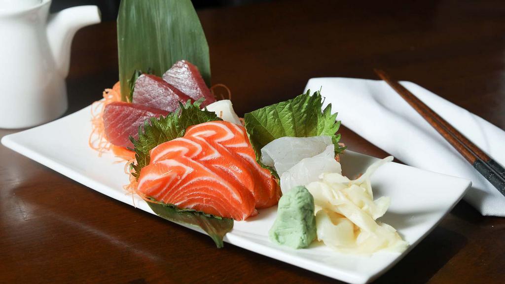 Sashimi Lunch · Ten pieces of assorted raw fish. Served with miso soup and a salad.