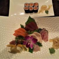 Sushi And Sashimi Lunch · Three pieces of sushi, six pieces of sashimi and a California roll. Served with miso soup an...