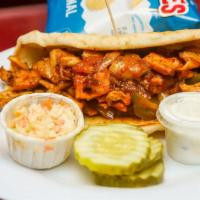 Chicken Souvlaki Sandwich · Served with marinated chunks of chicken topped with a mixture of tomatoes, onions and parsle...