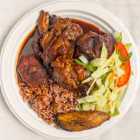 Chicken Brown Stew · Includes steamed vegetables or fresh salad and plantains.