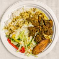 Goat Curry · Includes steamed vegetables or fresh salad and plantains.