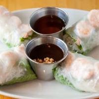 Goi Cuon Tom (Two Pieces) · Shrimp summer roll. Soft salad roll, filled with shrimp, bean sprouts, lettuce, fresh herbs,...