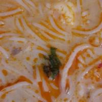 La Sa Tom Soup · Spicy. Curry coconut shrimp soup, rice vermicelli, and basil.