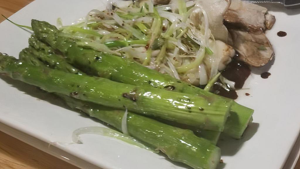 Steamed Chilean Sea Bass (Filet) · Spicy. Steamed with fresh shiitake mushroom, asparagus, ginger and scallion in soy dressing and drizzled with perfected temperature olive oil.