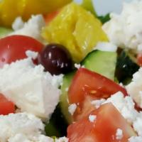 Greek Salad · Romaine lettuce, red onion, feta cheese, tomatoes, cucumbers, pepperoncini peppers, kalamata...