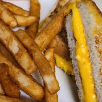 Grilled Cheese · Served with fries.