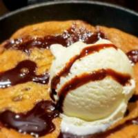 Chocolate Chip Skillet · Giant chocolate chip cookie served in our iron skillet, served with ice cream and chocolate ...