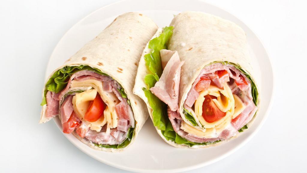 Turkey & Cheese Wrap · Delicious wrap made with Turkey and cheese, topped with lettuce, tomatoes, and onion.