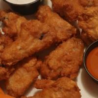 Crispy Chicken Wings · Choice of sauce: BBQ, buffalo, & honey garlic soy sauce.