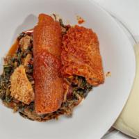 Egusi Soup · Made of special mixed of melon seeds and spinach casserole, garnished with stockfish and ser...