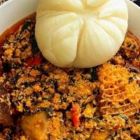 Fufu With Egusi And Meat · Fufu with egusi and assorted meat