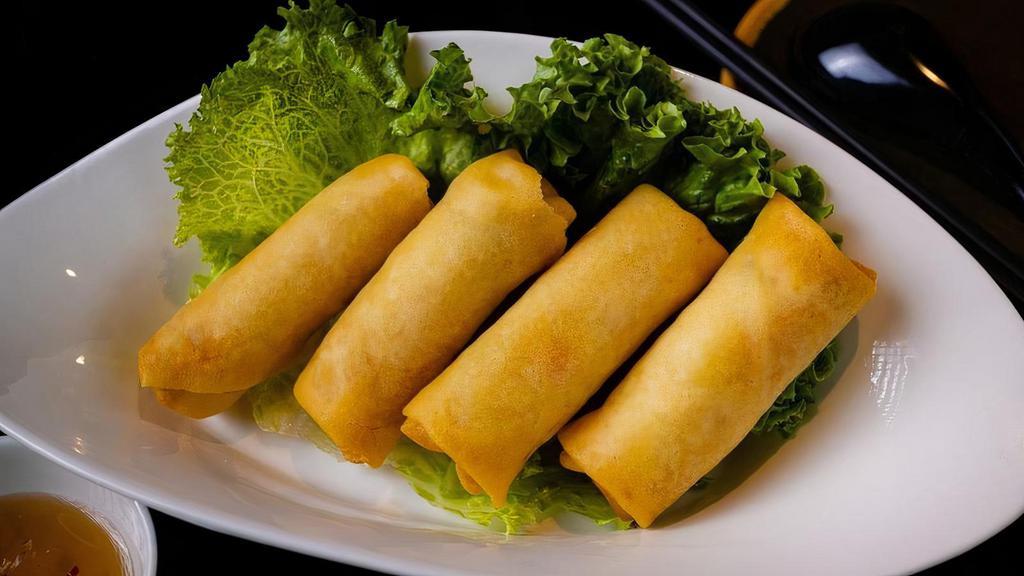Veggie Crispy Spring Rolls · cabbage, bean thread vermicelli, carrots, onion, golden wheat flour wrapper, with lettuce and vibrant 