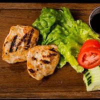Chicken Breasts · tare-soy marinated, boneless; served with rice.