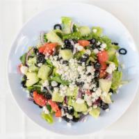 Greek Salad · Romaine lettuce, tomato, mixed peppers, olives, red onions, cucumber, feta cheese.
