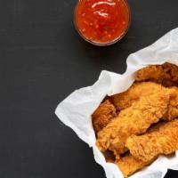 Chicken Tenders · Fresh batch of chicken fingers, served with celery, carrots, and honey mustard.