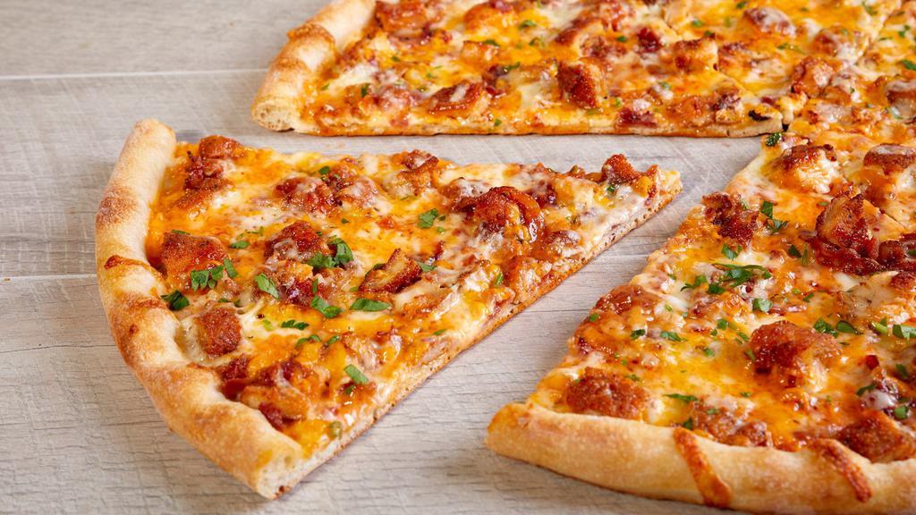 Boone Pizza · Chicken Cutlet, Bacon, Mozzarella Cheese, Cheddar Cheese & Thousand Island Dressing.