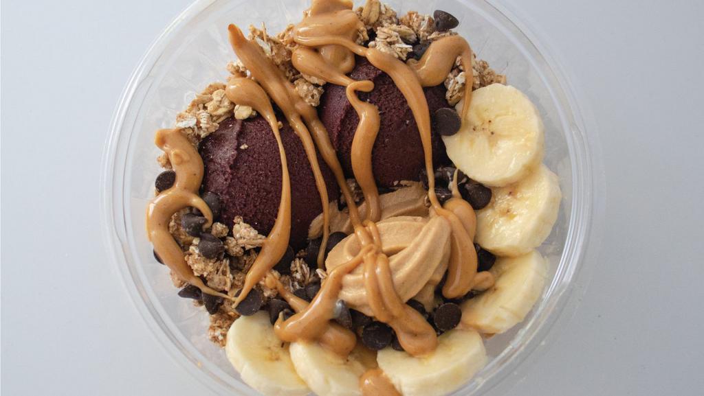 Pb Power Boost Bowl  · Acai paired with granola, dark chocolate chips, banana, and peanut butter sauce