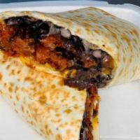 Burrito Vegetariano · Cheddar cheese & mozzarella black beans peppers onion & lettuce rice.