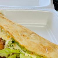 Mexican Quesadilla · Handmade corn tortilla meat of choice oaxaca and cotija cheese, lettuce, Mexican cream.